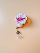 load image into gallery viewer, glitter pill badge reel, pink