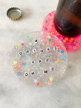 load image into gallery viewer, drinks are on me coaster, round