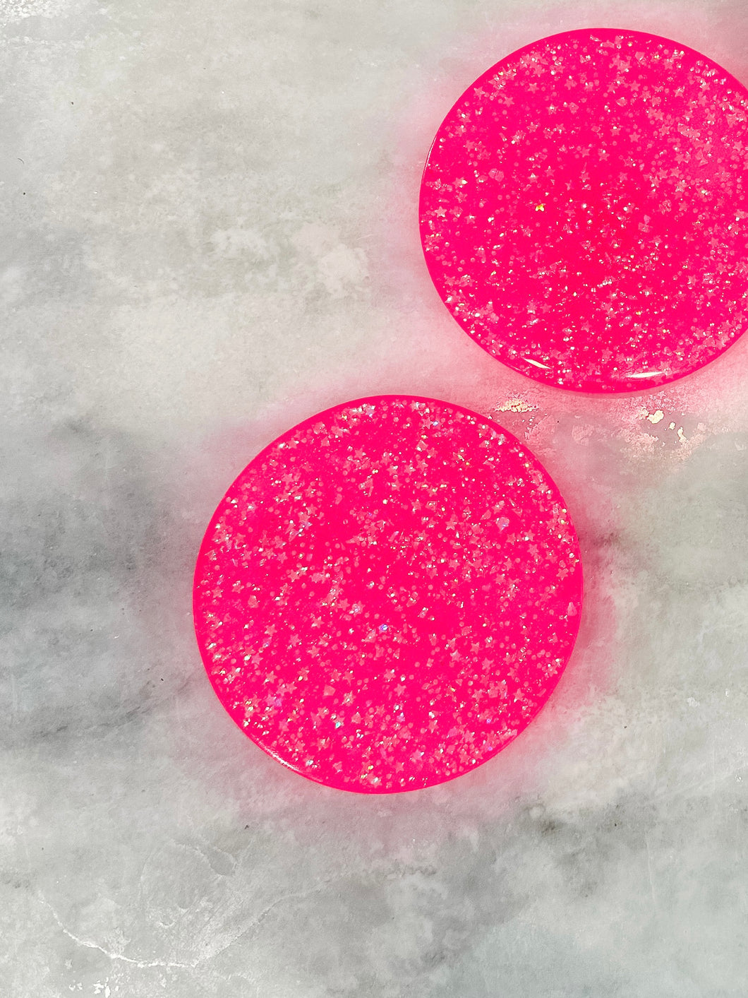 neon pink glitter bomb coaster