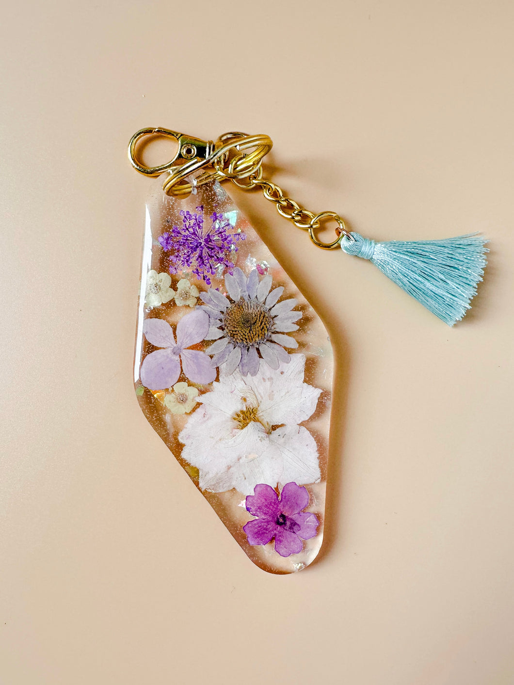 lavender dried floral keychain with iridescent flakes