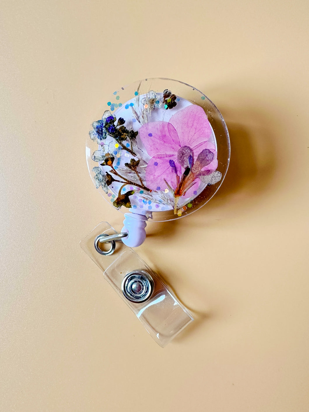 garden floral with iridescent glitter badge reel