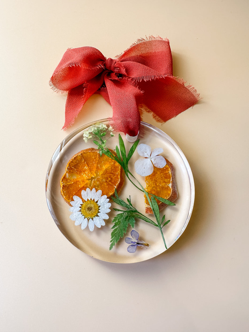 orange with burgundy dried floral ornament