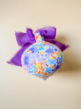 load image into gallery viewer, hand painted ceramic ornament, purple and orange with holo glitter
